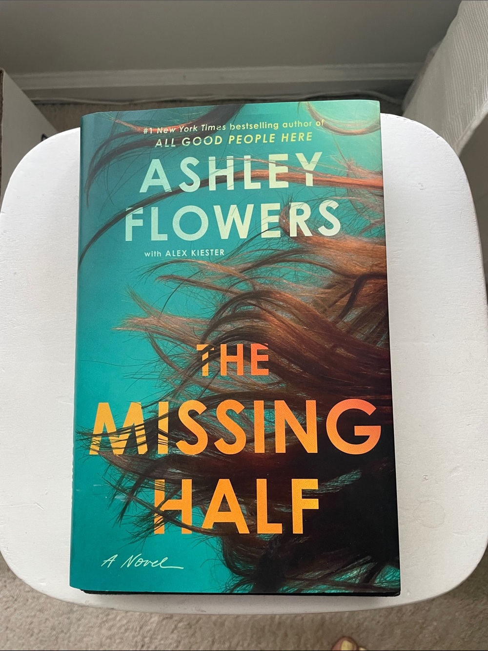 Mystery Paperback with Teal & Orange Cover Text